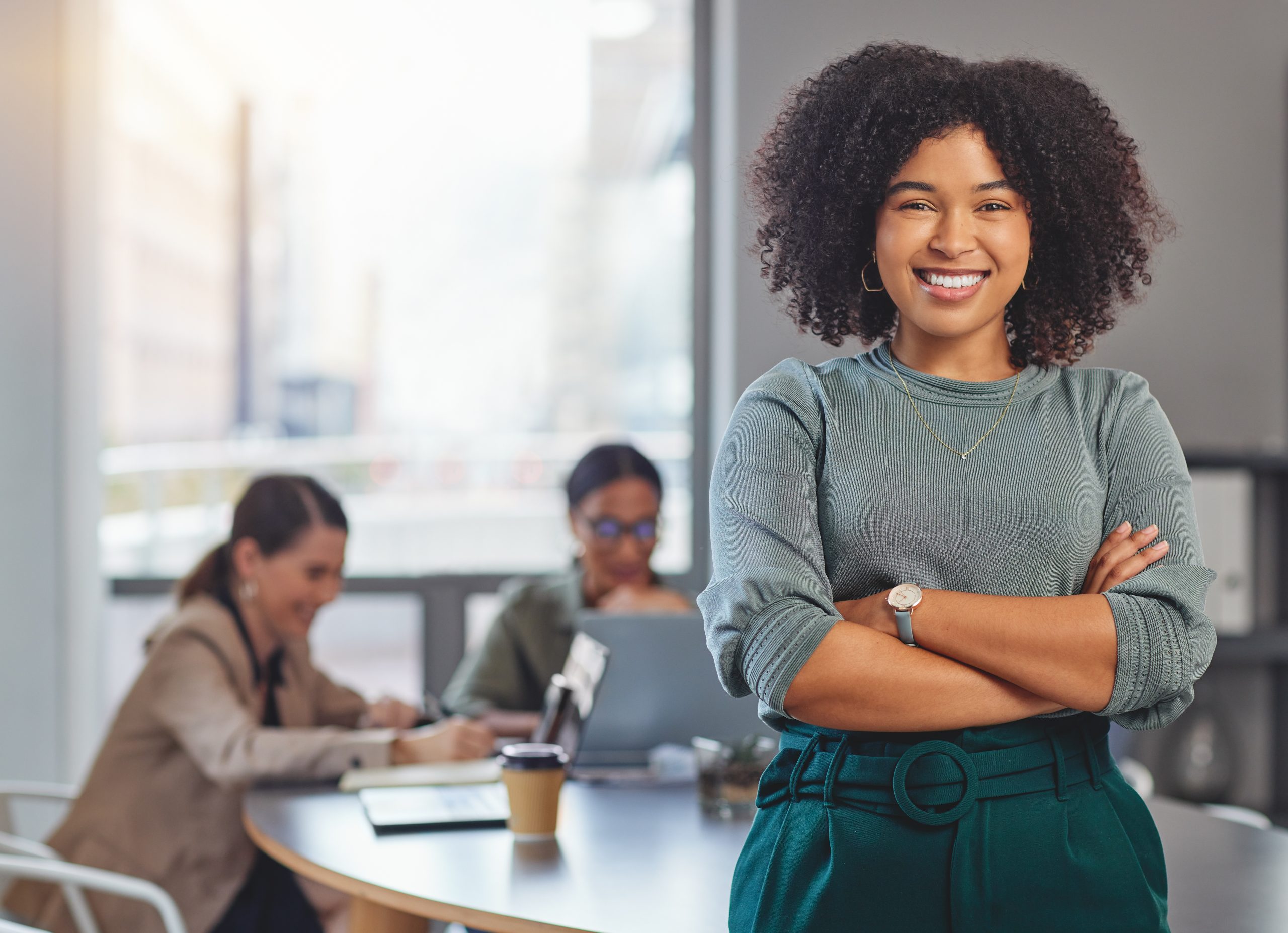 Happy, arms crossed and portrait of business woman in meeting for planning, smile and professional. Happiness, career and workshop with female employee in office for creative, confident and startup.